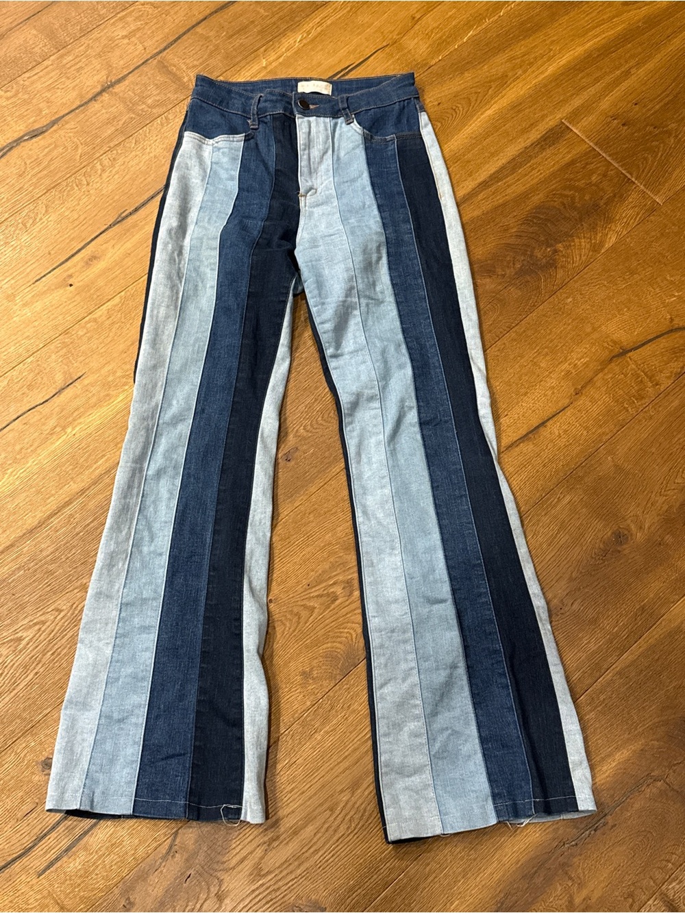 Altar'd State Two-Tone Vertical Stripe Flare Jeans in Light Blue and Dark Blue